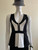 River Island Sleeveless Peplum Top front view with black side panels, white centre panel & exposed gold zip