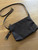Samsonite Skyler Purple Crossbody Bag flat lay top view with removable matching strap