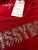 Sissy Boy Reflective Logo Red T-Shirt close-up of inner neck tag with Sissy Boy branding and logo visible