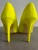Superbalist Neon Yellow Heels back view of heels with stitching detail, minor scuffs & vibrant neon yellow color