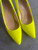Superbalist Neon Yellow Heels angled top front view with pointed toes, nude insoles & inner branding