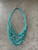 Teal Beaded Multiple Layered Necklace top front view showing bead strand layers & silver adjustable tie