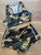 Camo Activewear Set front flat lay of camo crop bra & shorts with black waistband & white stripe detail