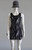 Black & White Overlay Mini Dress closer front with layered stripe pattern across dress with floral print