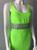 Neon Green Bodycon Maxi Dress close front view with scoop neck & silver studded waist panel grid design