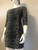 Vero Moda Leopard Print Bodycon Mini Dress angled front side view showing all over leopard print & contrasting black vertical panels on the side of the dress & sleeve