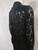 Vero Modo Sheer Black Blouse angled back view showing floral sheer pattern & textured black finish.