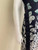 Versace Draped One Shoulder Butterfly Midi Dress closeup lower right skirt with vertical black satin ribbon & butterfly print