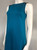 Woolworths Teal Sleeveless Mini Dress angled front showing exposed shoulders, sleek fit with brown hem contrast.
