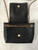 YSL Black Nolita Mini Crossbody Bag top view with smooth flap open & quilted lambskin front panel, gold chain & magnet close