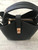 Woolworths Black Crossbody Twist Lock Bucket Bag - front view with top handle, 2 interior open pockets & middle zip section