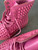 Dr. Martens Pink Spike Boots side top view showing inner collar area with visible brown mark & spike details
