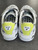 PUMA x Shantell Martin Platform Strap Sneakers back view showing neon yellow accents & bold graphics