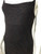 Glassons Black Metallic Shimmer Mini Dress close up front with bright lighting highlighting the metallic shimmer