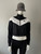 Nike Black Cropped Full Zip Track Jacket front view in black & white chevron pattern with Nike logo on chest
