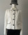 Finnigans by Truworths White Formal Jacket Front View with Geometric Pattern, Black Buttons & Flap Pocket Detail