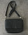 Busby Black Leather Flap Crossbody Bag front view wtih grainy leather, silver hardware & adjustable strap