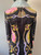 Versace Ventagli La Greca Coat upper back with black jacquard print, fan print in pink,  purple, yellow & gold chain print