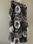 Michael Kors Metallic Floral Sequin Mini Dress angled front showing mini length, slight flare & detailed sequin flowers