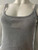 Alexander Wang Silver Metallic Tank Bodycon Mini Dress close up chest of WANG embossed logo & fine knit thread