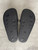Moschino Gold Logo Slides outsole view showing very light wear, textured black outsoles with grip pattern & size 38