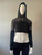Black Mesh Panel Hooded Crop Top full front view with sheer mesh panels along upper chest & shoulders & ribbed cuffs