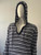 Be Hip Designer Wear Black & White Striped Knit Hoodie closer angled front with hoodie worn on mannequin & relaxed, casual knit