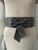 Grey Wide Elastic Bow Dress Belt front view worn on mannequin with grey stitching & large grey bow in the centre
