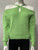Green Cut-Out Shoulder Knit Sweater closer front view with long sleeves & crossover neckline with open shoulder detail