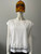Next Downtime White Cutout Detail Oversized T-Shirt front view with geometric cutouts at the neckline & hem