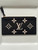 Louis Vuitton Félicie Pochette Black Zippered Pouch Insert front view in black with giant cream monogram & leather zip pull