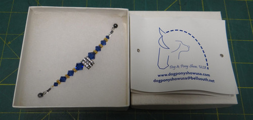 Dog & Pony Show USA Swarovski Crystal Pin Blue, Gold, Yellow, and Black Colored