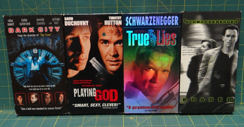 Lot of 4 Action VHS Tapes  True Lies, Eraser, Dark City, Playing God