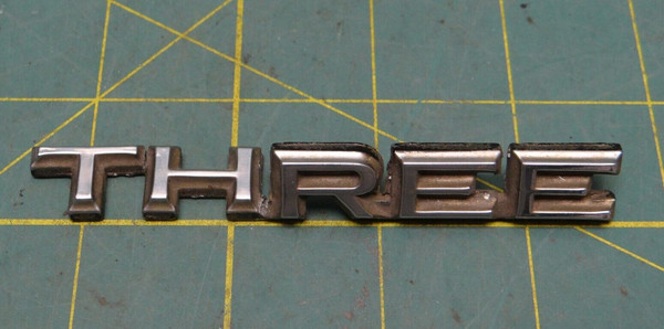 Vintage Plymouth Chrysler "THREE" 60's 70's Emblem Decal P/N 2841731