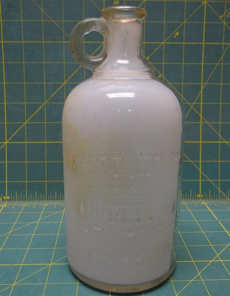 1909 White House Vinegar Glass Bottle, Half Clear Half White, 3.75"D 9"H