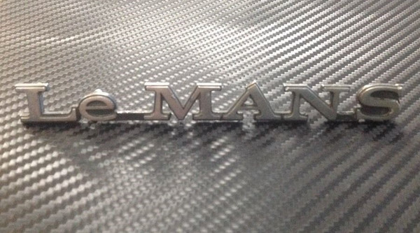 Original Vintage OEM Pontiac LeMans Emblem 9799507
