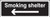 Smoking shelter left arrow (white/black) - Safety Sign