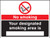 No smoking designated smoking area is (white/black) - Safety Sign