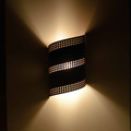 WL64 Chama Southwestern Twist Wall Sconce with 3 Rows of Square design- Night View