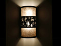 WL260 Laguna Southwestern Wall Sconces with Petroglyphs design- Night View