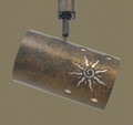 TH41 Southwestern track light with Sun design in statuary bronze finish with silver mica liner