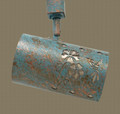 TH60 Southwestern Track Light with Hummingbird and Diamonds design in patina copper finish with silver mica liner