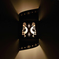 WL181- Nambe Southwestern two tier twist wall sconce with Kokopelli design- Night View