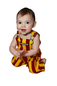Infant wearing maroon and gold striped cotton overalls with bold vertical stripes at a tailgate Infant wearing maroon and gold striped cotton overalls with bold vertical stripes at a tailgate