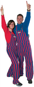 A man and woman wearing striped royal blue & red game bib overalls.