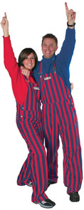 Man and woman wearing navy blue & red striped game bib overalls.