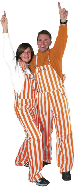 A man and woman wearing striped burnt orange & white game bib overalls.