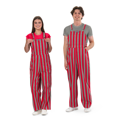 A man and woman wearing striped scarlet & grey game bibs overalls.