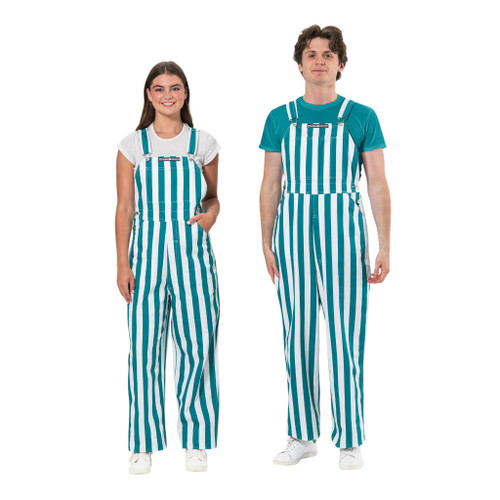 Male and female models standing together in vibrant teal and white striped gameday overalls.