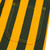 Green and yellow striped toddler Game Bibs overalls rear pocket detail with reinforced stitching.